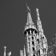 IMG_7109_bw_t-2 Milan Cathedral (Italian: Duomo di Milano) is the cathedral church of Milan, Italy. Dedicated to Santa Maria Nascente (Saint Mary Nascent), it is the seat of...