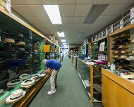 2017-08-07_126598_WTA_5DM4 Henry the Hatter Store - Detroit, Michigan. Henry Komrofsky had worked as a hatter at the John C. Hartz shop before deciding to open up his own shop. Gustave...