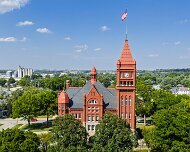 2025-09-15_345315_WTA_Mavic_4_Pro_1x The Montgomery County Courthouse in Red Oak, Iowa, completed in 1891, is a commanding example of Richardsonian Romanesque architecture and reflects the...