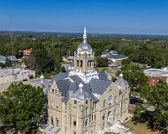 2025-10-05_412730_WTA_Mavic_4_Pro_1x The courthouse for Johnson County, Missouri in Warrensburg was constructed between 1896 and 1898 under architect George E. McDonald and stands as a striking...
