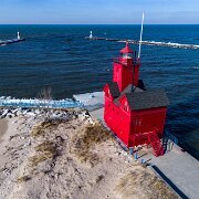 2017-01-01_01723_WTA_Phan4Pro The Holland Harbor Light, known as Big Red, is located in Ottawa County, Michigan at the entrance of a channel connecting Lake Michigan with Lake Macatawa, and...