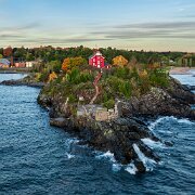 2024-10-16_488609_WTA_Mavic 3 Fall Colors - Day 4 Marquette to Calumet The Marquette Lighthouse, one of the oldest structures on Lake Superior, was first built in 1853 to guide ships into...