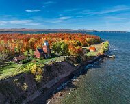 2024-10-16_488855_WTA_Mavic 3 Big Bay Point Lighthouse, located on a rugged bluff overlooking Lake Superior in Michigan’s Upper Peninsula, was constructed in 1896 to address the dangerous...