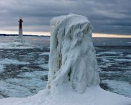 2026-02-01_304028_WTA_Mavic_4_2.5x The Muskegon South Breakwater Light, standing at the entrance to Muskegon Lake on Lake Michigan, was established in 1872 to guide ships serving one of West...