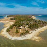 2024-10-19_497529_WTA_Mavic 3 Fall Colors - Day Iron Mountain to Mackinaw City The Peninsula Point Lighthouse, located at the southern tip of Michigan’s Upper Peninsula near Escanaba, was...