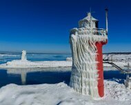 2026-02-01_303522_WTA_Mavic_4_1x The South Haven Lighthouse, marking the entrance to the Black River on Lake Michigan, has guided vessels since 1872, when the first wooden pier lights were...