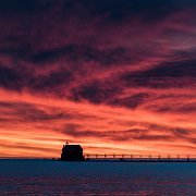 2020-05-31_006891_WTA_5DM4 Grand Haven, Michigan - Sunset Grand Haven South Pierhead Entrance Light is the outer light of two lighthouses on the south pier of Grand Haven, Michigan where...