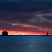 2020-05-31_007051_WTA_5DM4 Grand Haven, Michigan - Sunset Grand Haven South Pierhead Entrance Light is the outer light of two lighthouses on the south pier of Grand Haven, Michigan where...