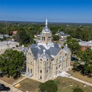 2025-10-05_412730_WTA_Mavic_4_Pro_1x The courthouse for Johnson County, Missouri in Warrensburg was constructed between 1896 and 1898 under architect George E. McDonald and stands as a striking...