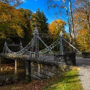 2020-10-22_00463_WTA_R5_HDR The Mill Creek Park Suspension Bridge is a bridge in Youngstown, Ohio, United States. The 1895 bridge carries Valley Drive across Mill Creek to connect the east...
